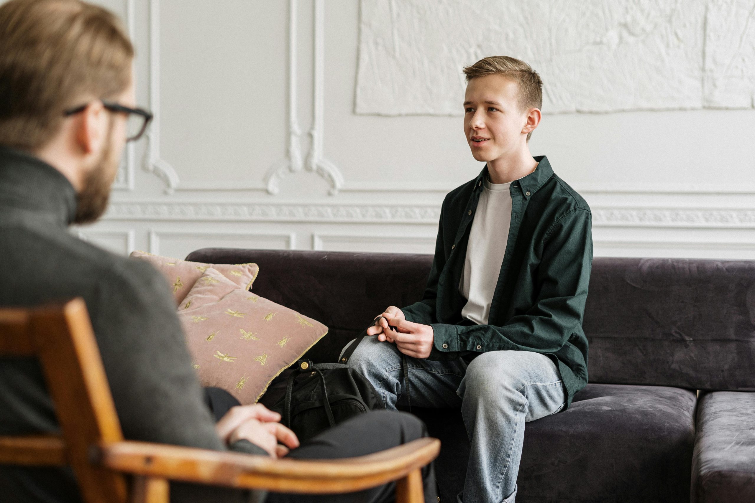 an image of a teen male in counseling