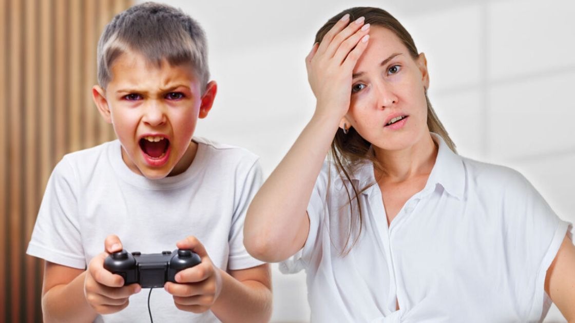Teen boy yelling while gripping a game controller as concerned mother reacts to sudden gaming-related anger at home.