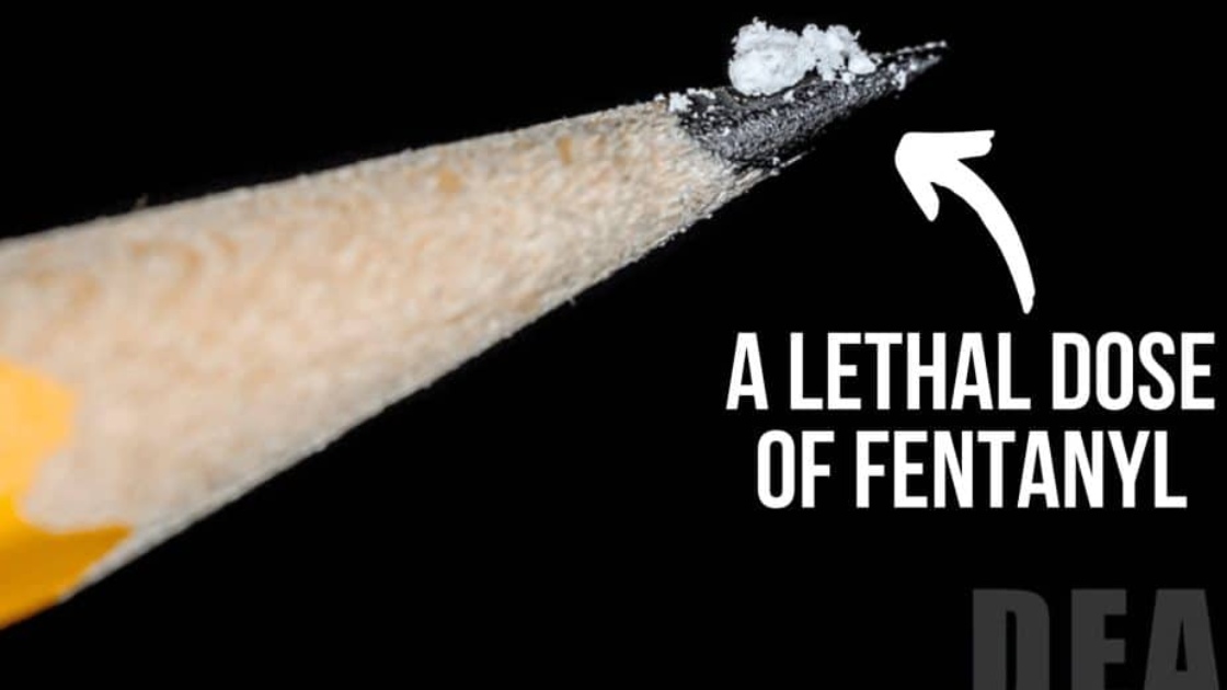 A tiny fentanyl amount on a pencil tip, illustrating overdose risk and extreme potency that can be fatal to teens.