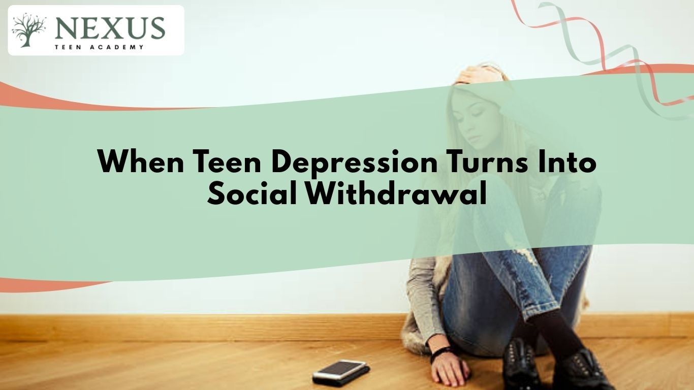 Teen girl sitting alone on floor, reflecting teen depression and social withdrawal in mental health treatment article.
