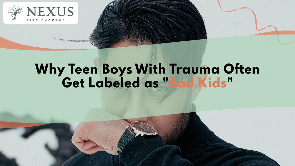 Teen boy covering his face, reflecting why teen boys with trauma are labeled as bad kids instead of understood and supported.
