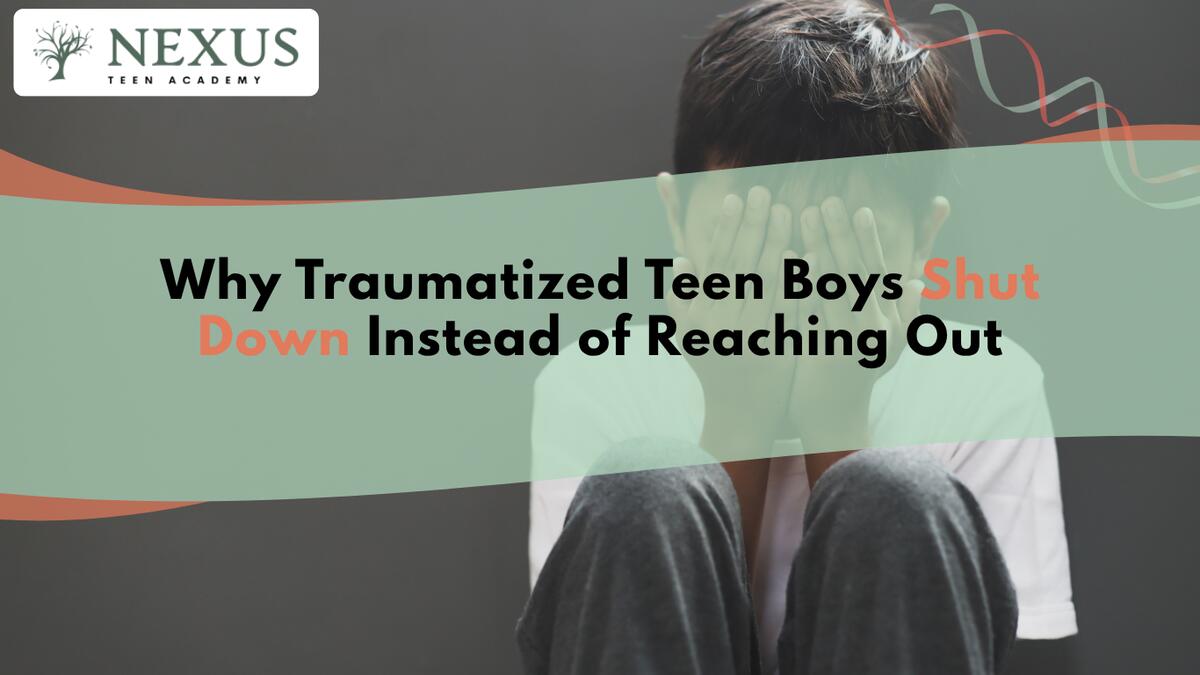 Teen boy hiding his face, symbolizing traumatized teen boys shutting down as a protective response to trauma.