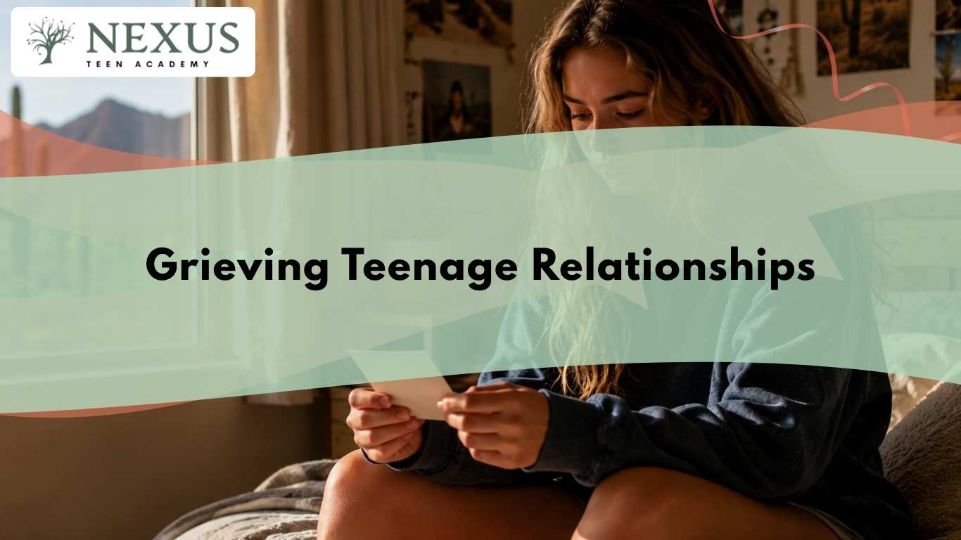 Teen girl sitting alone holding a photo after a breakup, reflecting the emotional impact of grieving teenage relationships.